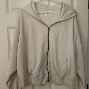 american eagle cream colored zip up waist lengthXL worn once